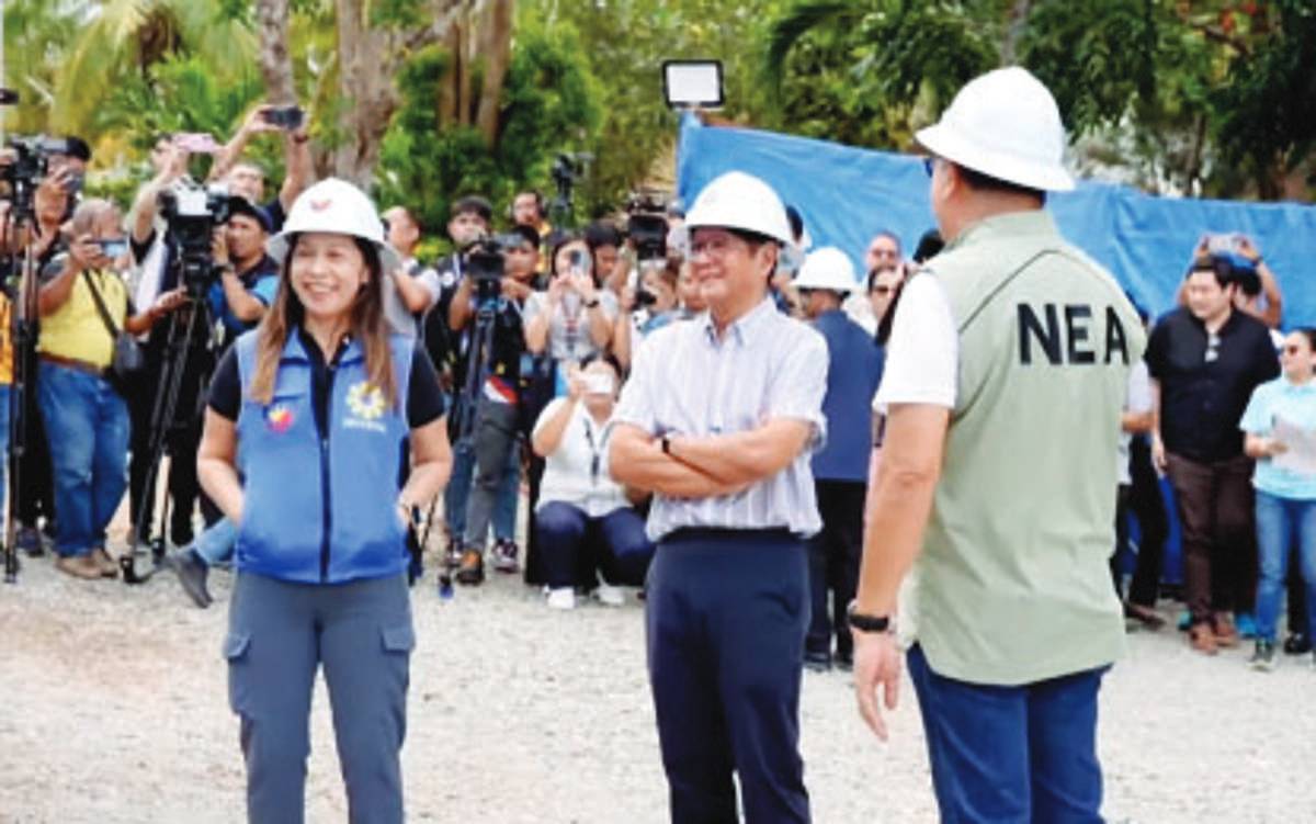 President Ferdinand R. Marcos, Jr. (center) leads the ceremonial switch-on of the new 17.8-megawatt Siquijor Power Plant at the Siquijor Electric Cooperative (PROSIELCO) Power Plant in Larena yesterday, September 5, 2025. The chief executive was accompanied by Energy Secretary Sharon Garin (left) and NEA Administrator Antonio Mariano Almeda. (RTVM screengrab)