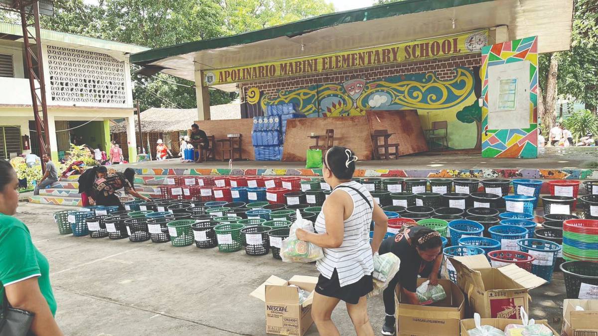The evacuation center at Apolinario Mabini Elementary School, where almost a thousand individuals displaced by the fire in Barangay 27, Bacolod City on September 12, 2025, are staying as of yesterday, September 16, 2025. The city government is working on acquiring the land occupied by the informal settlers titled under the name of an already terminated United States agency. (Bacolod City Communications Office photo)