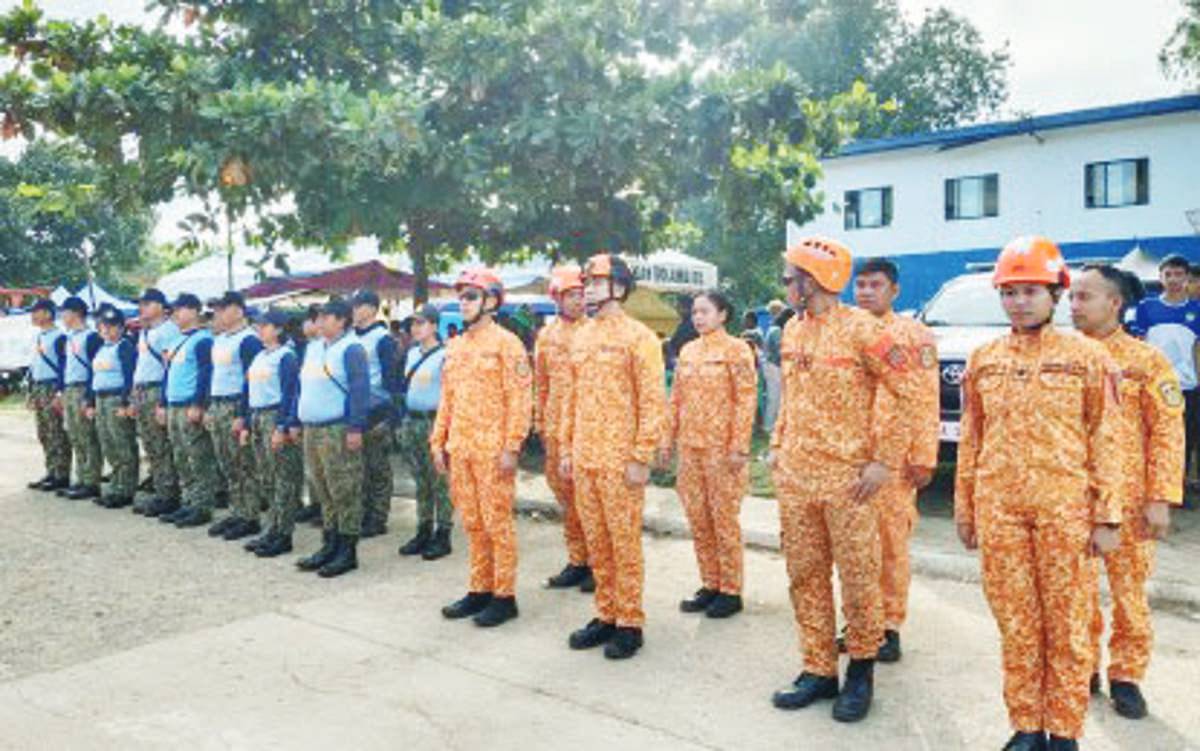 Personnel of the Bureau of Fire Protection - Bacolod Special Rescue Force (right) deployed at SM Cares Village, Barangay Pulambato, Bogo City on Thursday, October 2, 2025. A total of 100 policemen and firefighters from the Negros Island Region have been dispatched to Cebu province to augment search and rescue operations in areas devastated by the magnitude 6.9 earthquake. (BFP-Bacolod City Fire Station photo)