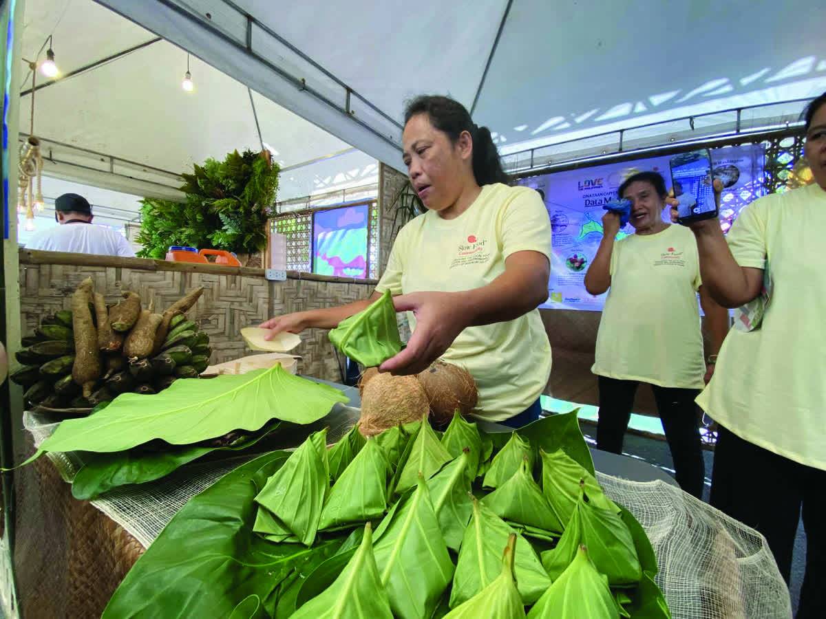 The Terra Madre Asia and Pacific, formally opened along North Capitol Road yesterday, November 19, 2025, gathered farmers, food champions and international participants to share forward-looking approaches that strengthen ecological protection and uphold local food sovereignty. Slow Food booths from both local and international producers line the stretch, offering a wide range of traditional dishes and cultural delicacies that highlight the richness and diversity of sustainable cuisine. (Cesar Jolito III / WDJ photo) 
