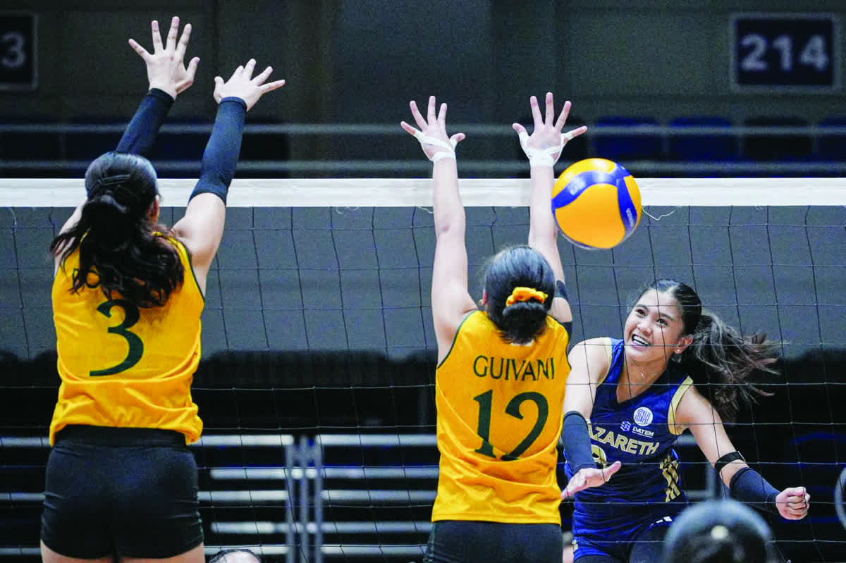 Negrense Diza Berayo led the National University Nazareth School Lady Bullpups with 22 points, including two service aces, displaying steely resolve to deny the Far Eastern University-Diliman Lady Tamaraws its upset bid. (UAAP photo)