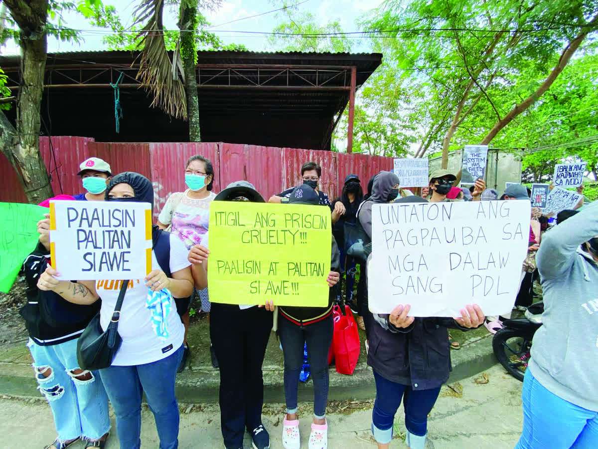 Families of persons deprived of liberty (PDLs) joined progressive groups in a noise barrage and protest at the Bureau of Jail Management and Penology - Negros Island Region office in Bacolod City’s Barangay Taculing yesterday, December 3, 2025, demanding an end to alleged “repressive and inhumane policies” under Jail Warden Crisyrel Awe. Inside the Negros Occidental District Jail - Male Dormitory, the PDLs held a 12-hour hunger protest, synchronizing their action with the families outside as both groups amplified the same call for humane treatment and accountability. (Cesar Jolito III / WDJ photo) 