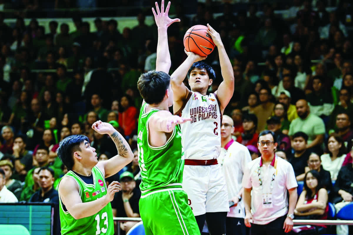 Negrense Reyland Torres finished with 11 points to help keep the University of the Philippines competitive in a tightly contested title decider that drew 24,339 fans and featured 16 lead changes throughout the game. (UAAP photo)