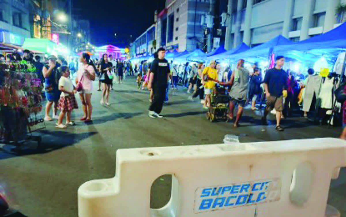The night market along Araneta Street in downtown Bacolod City is shown in this photo taken on December 14, 2025. Mayor Greg Gasataya is studying the establishment of a permanent night market as the city's month-long weekend night market ends on January 11, 2026. (PNA Bacolod / File photo)