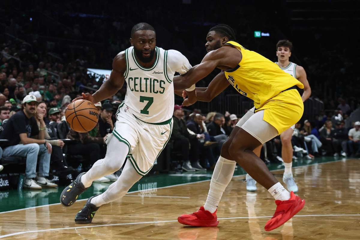 Boston Celtics guard Jaylen Brown (left) drives on Indiana Pacers forward Jarace Walker. (Winslow Townson / Imagn Images / Reuters)