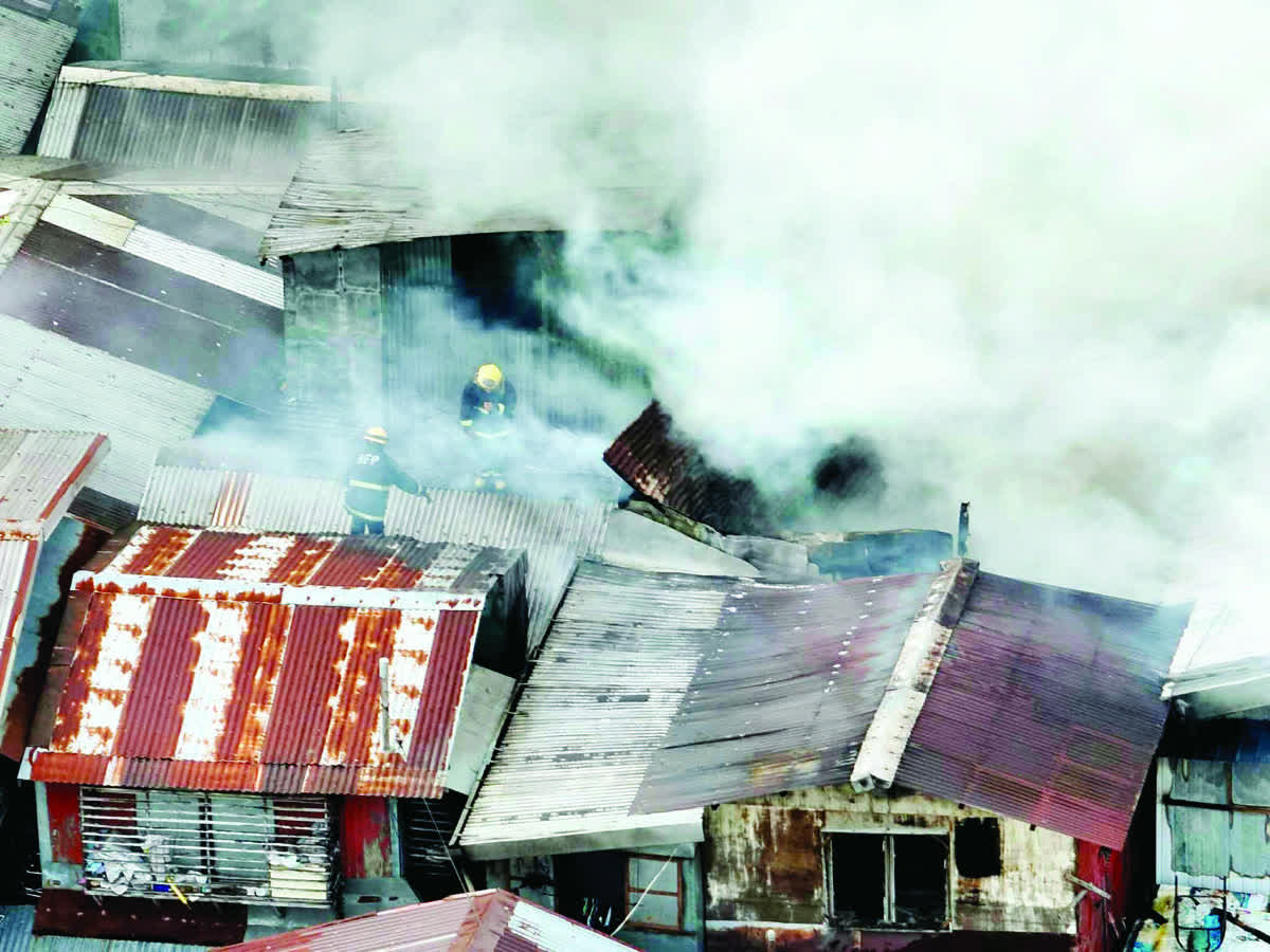 Firefighters raised their response to third alarm as the flames engulfed a densely populated area at Purok Tambipalad in Bacolod City’s Barangay 10 on Saturday afternoon, January 24, 2026. (BFP-NIR Bacolod City Fire Station photo)