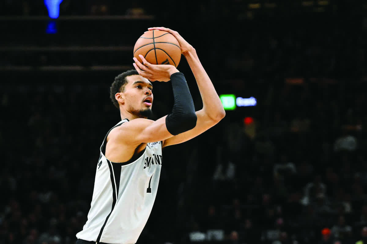 San Antonio Spurs forward Victor Wembanyama attempts a shot against the Boston Celtics. (Brian Fluharty / Imagn Images / Reuters)