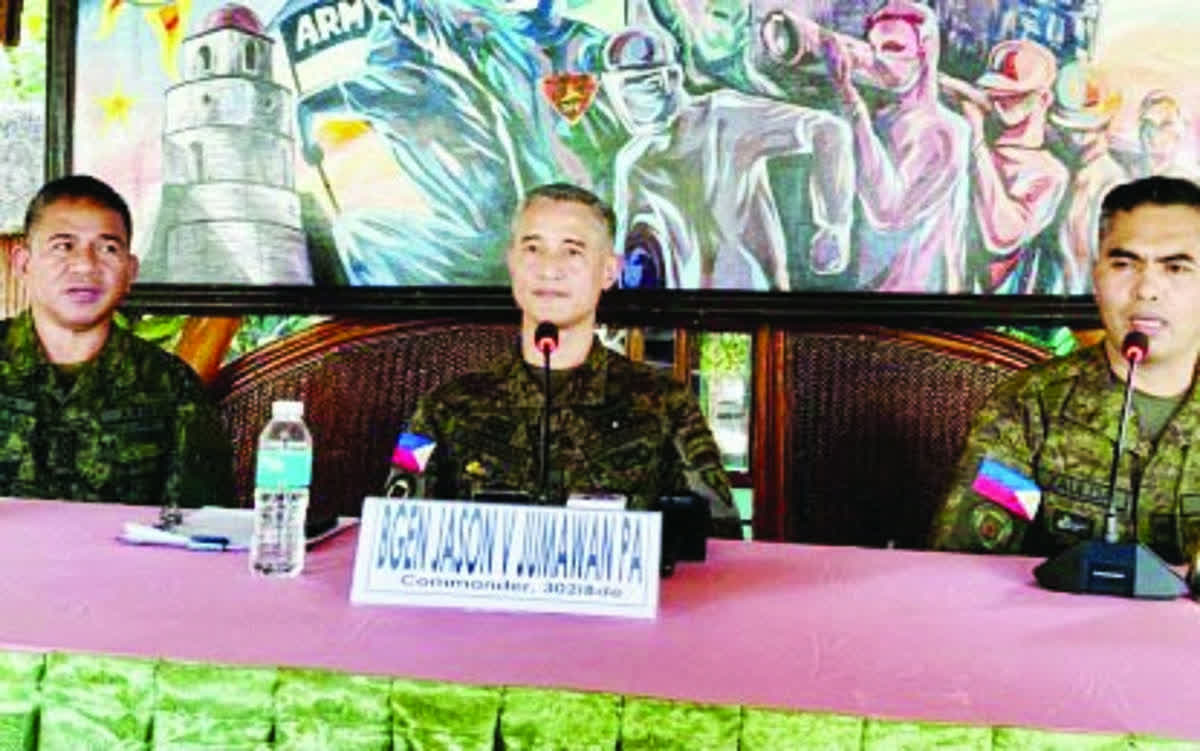 Brigadier General Jason Jumawan (center), commander of the Philippine Army’s 302nd Infantry Brigade, led a media briefing yesterday, February 16, 2026. The Army officials said tactical offensives are underway to run after New People's Army remnants who clashed with 11th Infantry Battalion troops in Barangay Sto. Niño, Tanjay City on Sunday, February 15, resulting in the death of one soldier and the wounding of another. (PNA photo)