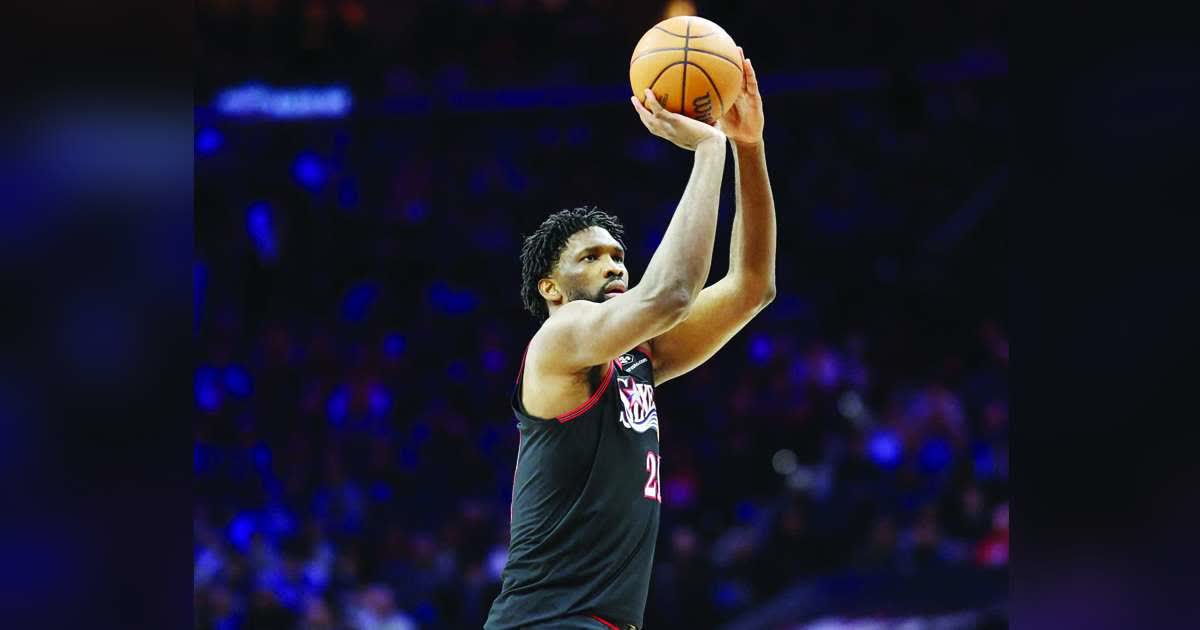 Philadelphia 76ers center Joel Embiid shoots the ball against the New Orleans Pelicans. (Bill Streicher / Imagn Images / Reuters)