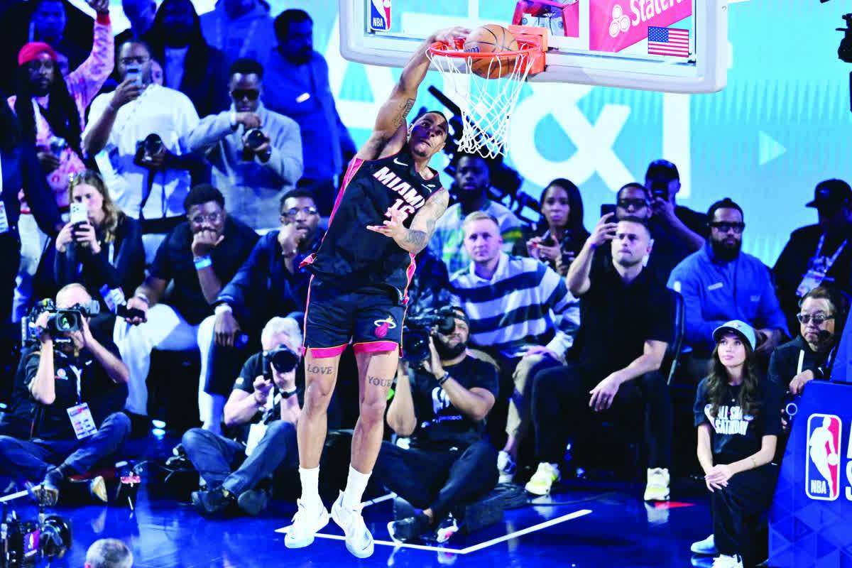 Miami Heat forward Keshad Johnson competes in the slam dunk competition during the 2026 NBA All-Star Saturday Night at Intuit Dome. (William Liang / Imagn Images / Reuters)