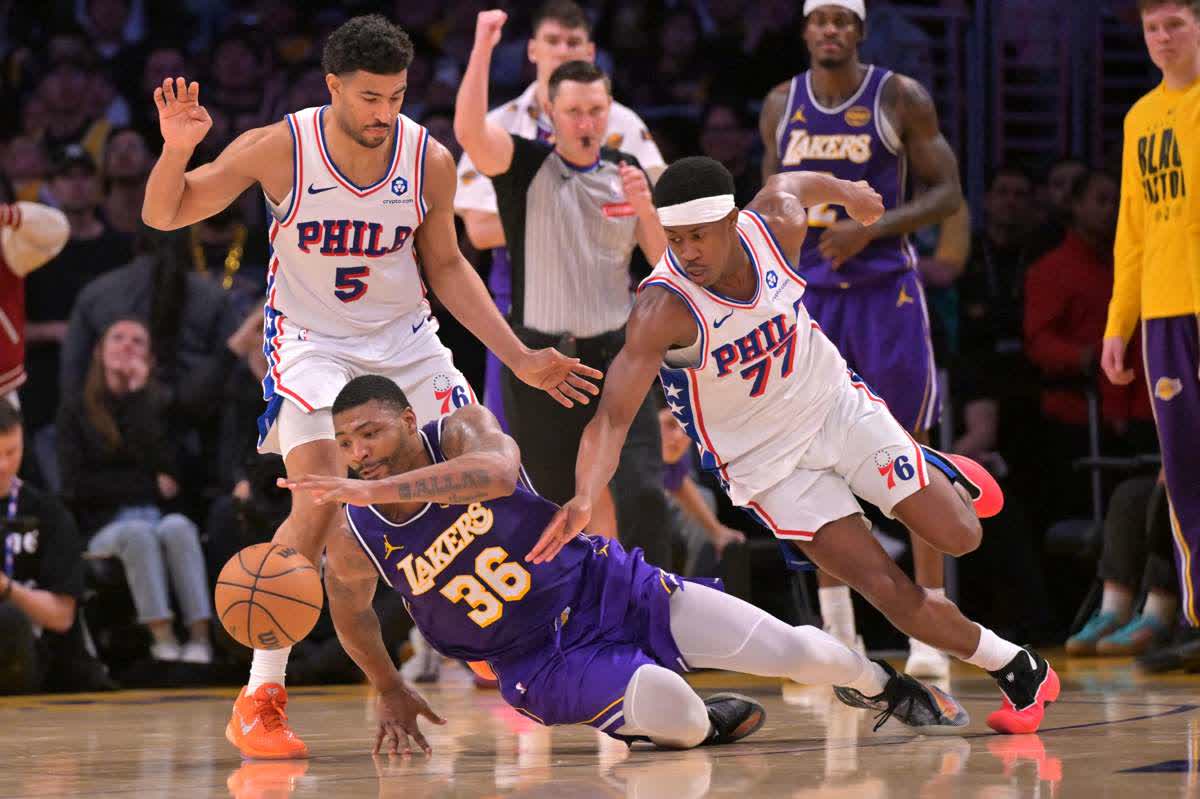 Lakers finally return home, beat 76ers but lose Doncic