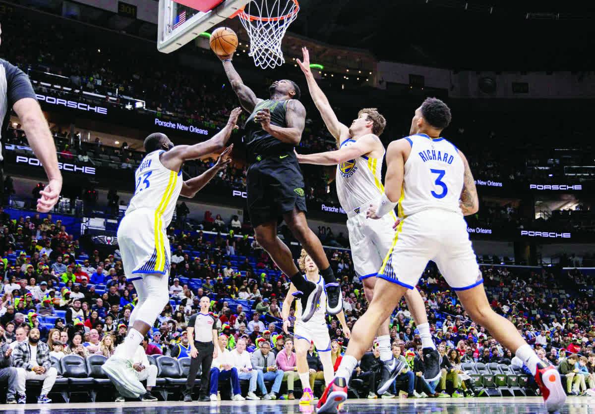 Pelicans withstand late Warriors push
