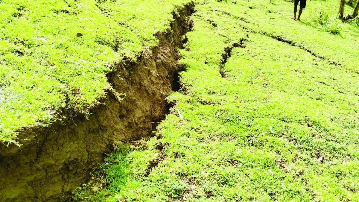 The Mines and Geosciences Bureau was notified for further investigation of a 30-meter radius sinkhole in a vacant lot at Barangay General Luna in Negros Occidental’s Toboso town. The construction of a nearby house has been halted due to the sinkhole's presence. Residents at the mountain's foot have been advised to exercise caution. (Contributed photo)