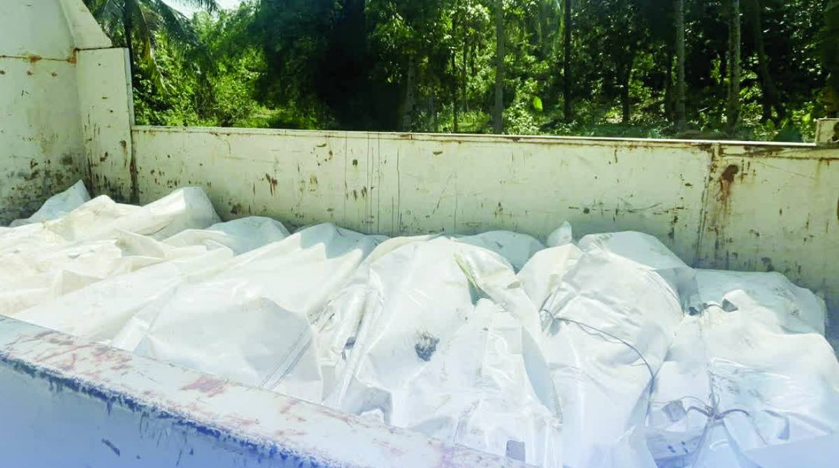 The remains of suspected New People’s Army remnants are being transported following an encounter with government troops at Barangay Salamanca in Negros Occidental’s Toboso town on Sunday morning, April 19, 2026. (Aksyon Radyo Bacolod photo)