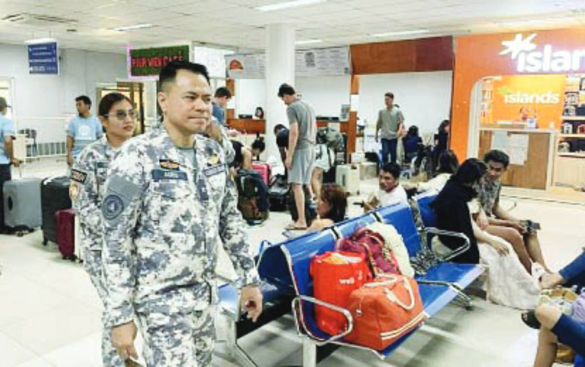 Coast Guard officers inspect the passenger terminal at the port of Dumaguete City, Negros Oriental on March 28, 2026. The Coast Guard Station in Negros Oriental assured the safe and smooth travel of passengers as it anticipates a higher volume of tourists during the summer break. (Coast Guard Station Negros Oriental / Facebook photo)