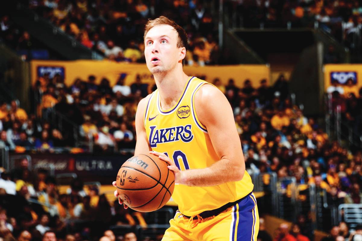 Denver Nuggets center Nikola Jokic (15) is fouled by Minnesota Timberwolves guard Anthony Edwards as he handles the ball. (Christopher Hanewinckel / Imagn Images via Reuters)