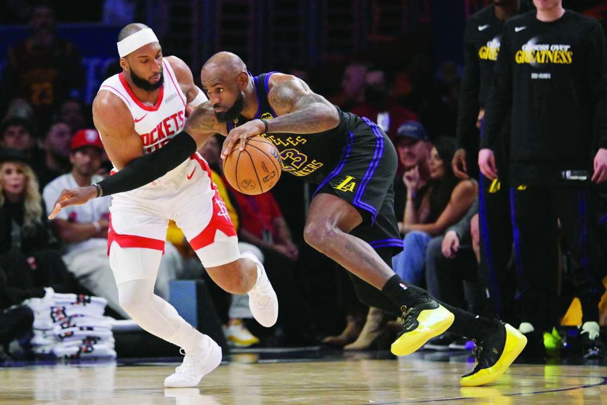 Josh Okogie (left) defends LeBron James during the second half of Game 2 of the NBA playoffs. (Jayne Kamin-Oncea / Imagn Images / Reuters)