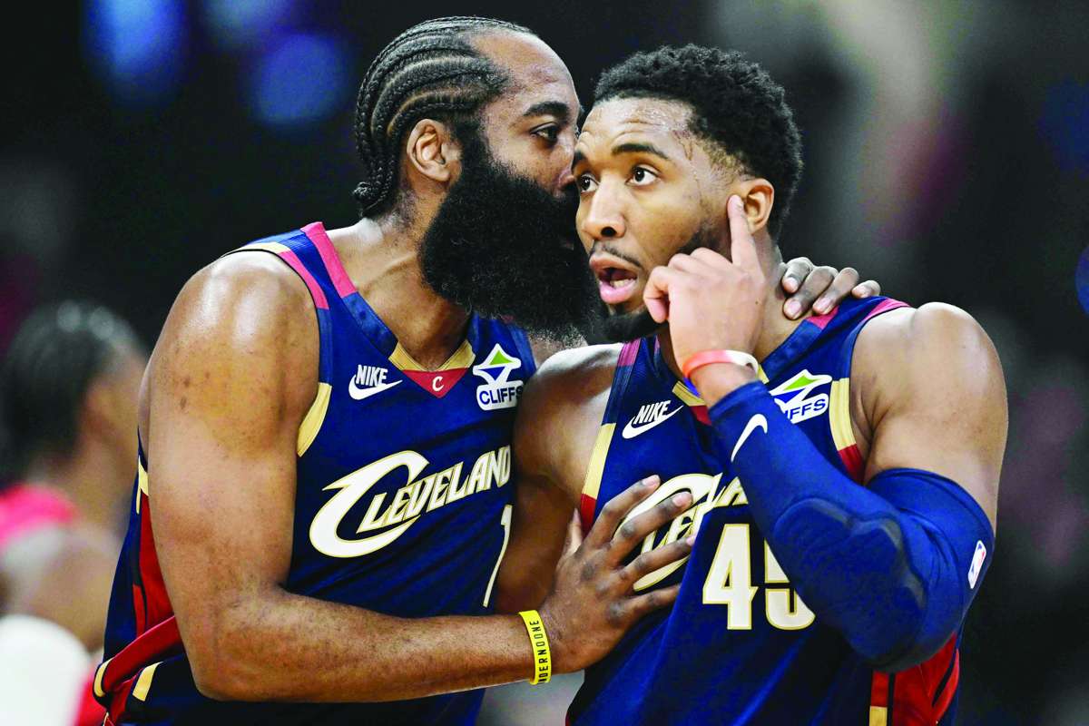 Cleveland Cavaliers guard Donovan Mitchell (right) talks with guard James Harden during Game 2 of the 2026 NBA Playoffs against the Toronto Raptors. (David Dermer / Imagn Images)