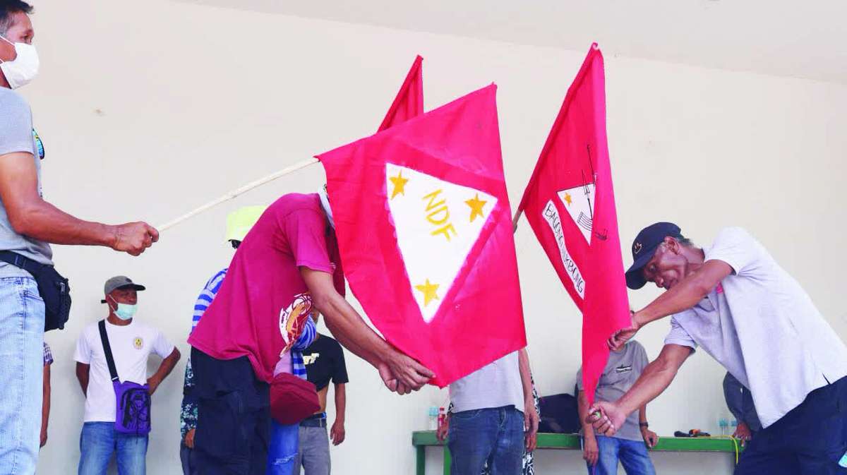 Residents in Negros Occidental’s Cauayan town stand united to condemn the continuing violence, fear and deception brought by the New People’s Army in Negros Island Region. They also called for justice for the innocent lives affected by armed conflict, recruitment, intimidation, and exploitation of the youth and vulnerable sectors in the communities. (Contributed photo)