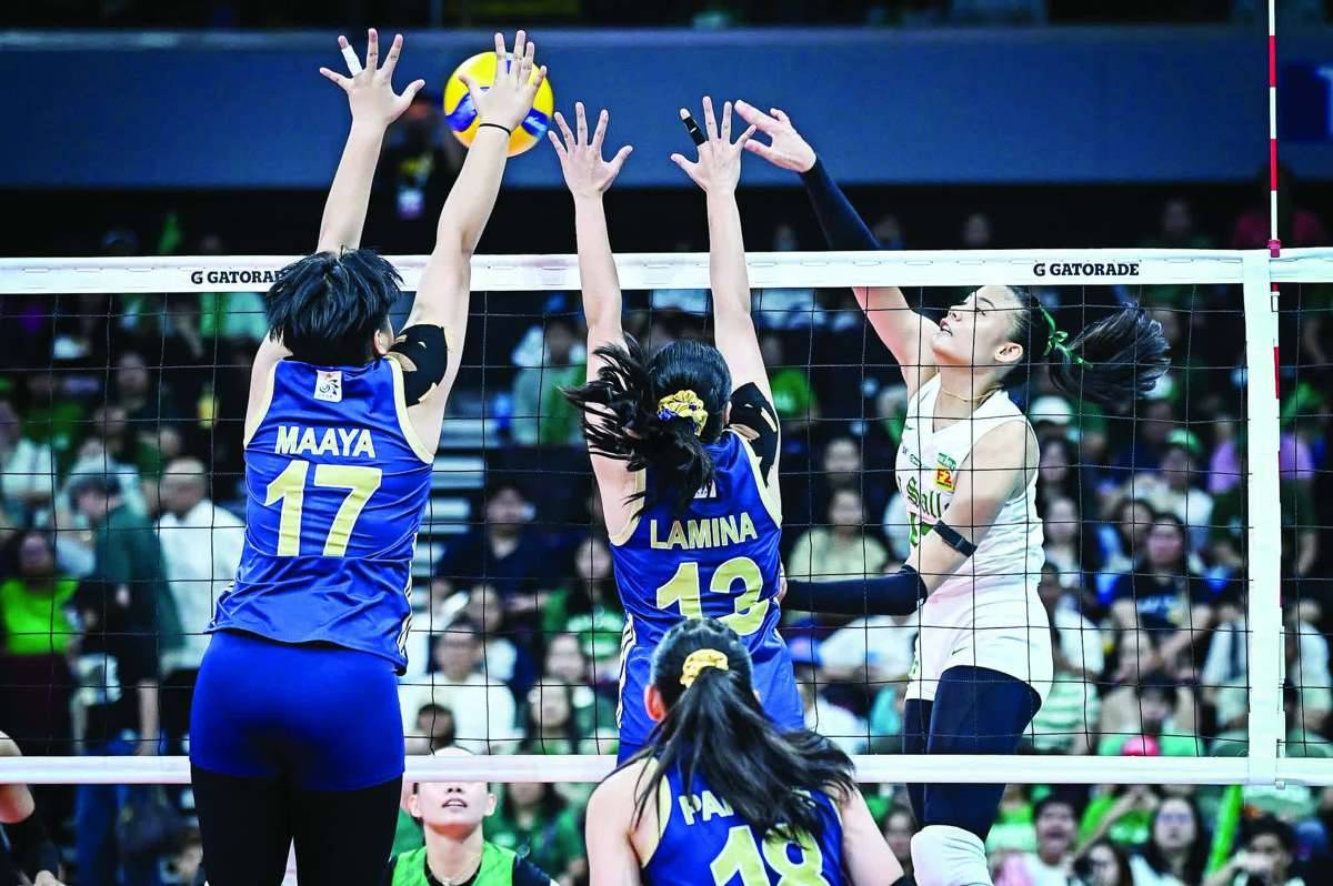 Negrense Angel Canino of the De La Salle University Lady Spikers was foiled by the defense of the National University Lady Bulldogs. (UAAP photo)