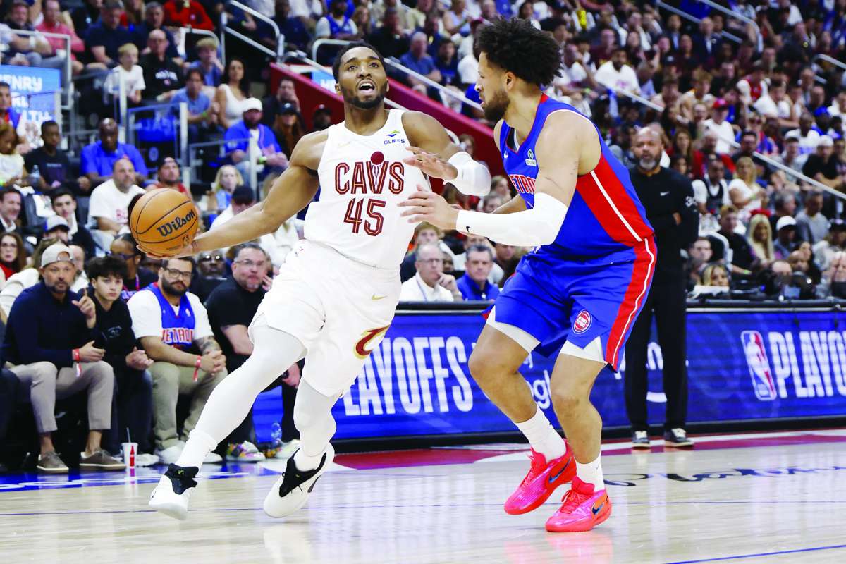 Cleveland Cavaliers guard Donovan Mitchell (left) dribbles against Detroit Pistons guard Cade Cunningham during Game 7 of the 2026 NBA playoffs. (Rick Osentoski / Imagn Images via Reuters)