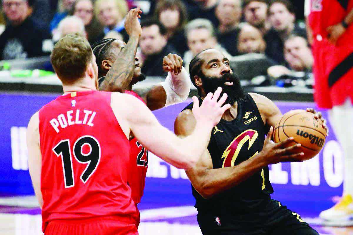 Cleveland Cavaliers guard James Harden (right) drives to the basket against Toronto Raptors guard Jamal Shead (center) and center Jakob Poeltl during Game 7 of the 2026 NBA playoffs. (Ken Blaze / Imagn Images via Reuters)