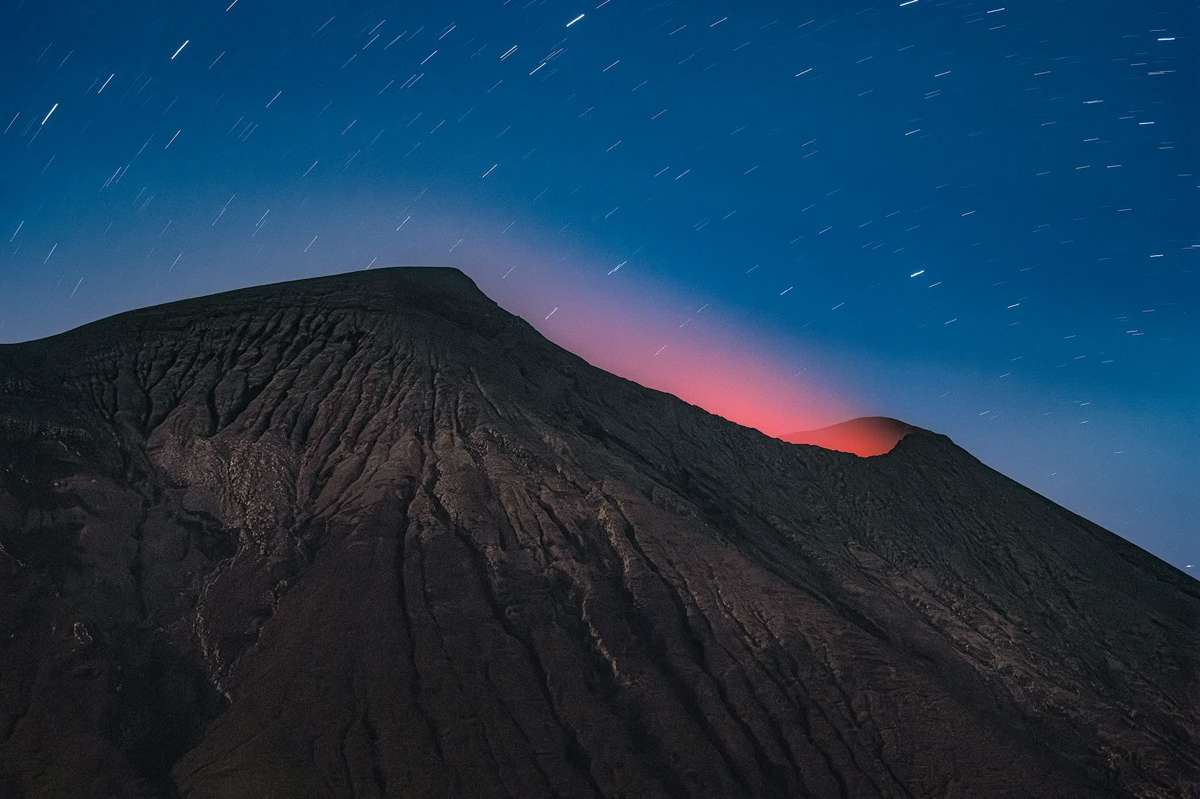 A crater glow on Kanlaon Volcano’s summit, caused by volcanic gas emissions, may indicate intensified heat within the crater and is among the visual parameters volcanologists use alongside seismic activity. (John Kimwell Laluma Photography)