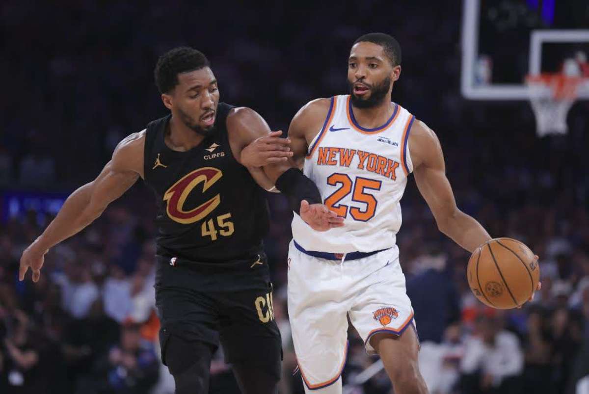 Cleveland Cavaliers guard Donovan Mitchell (left) defends against New York Knicks guard Mikal Bridges during Game 1 of the Eastern Conference Finals. (Brad Penner / Imagn Images via Reuters)
