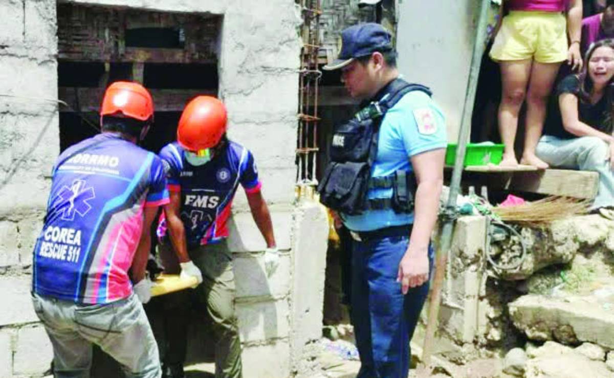 Responders retrieved the remains of a 53-year-old man after he was gunned down by three unidentified armed men inside his home at Barangay Dolis in Negros Occidental’s Calatrava town. (Contributed photo)