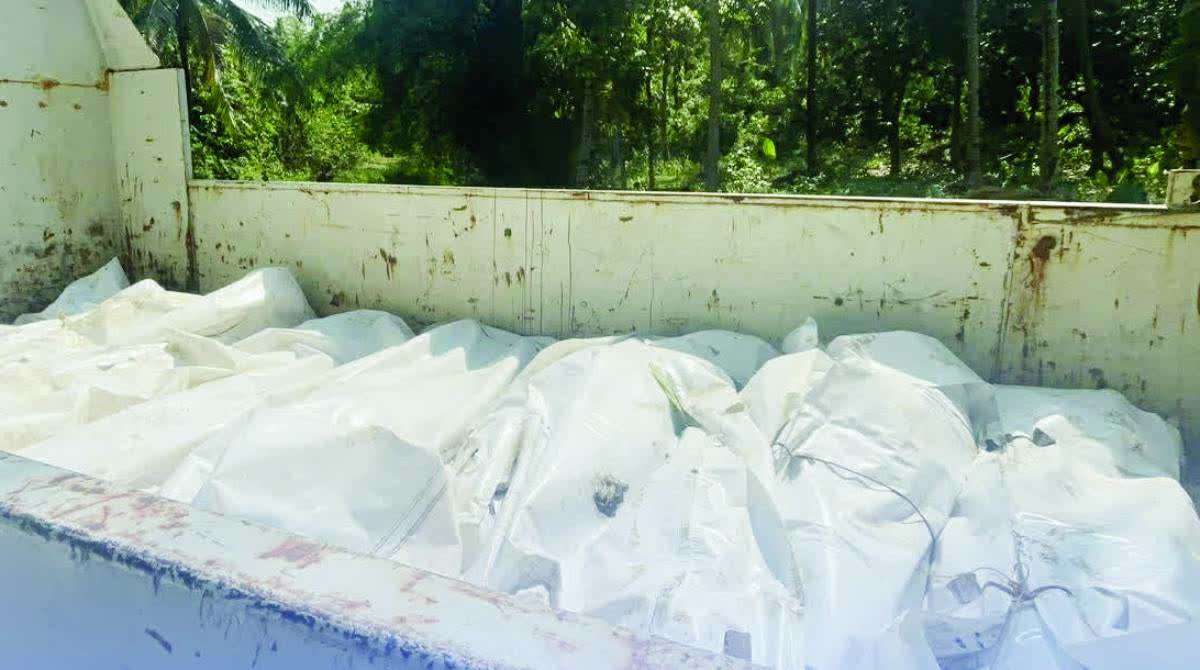 The remains of suspected New People’s Army remnants are being transported following an encounter with government troops at Barangay Salamanca in Negros Occidental’s Toboso town on April 19, 2026. A fact-finding mission’s documentation suggests that at least six of the fatalities were unarmed civilians. (Aksyon Radyo Bacolod photo)