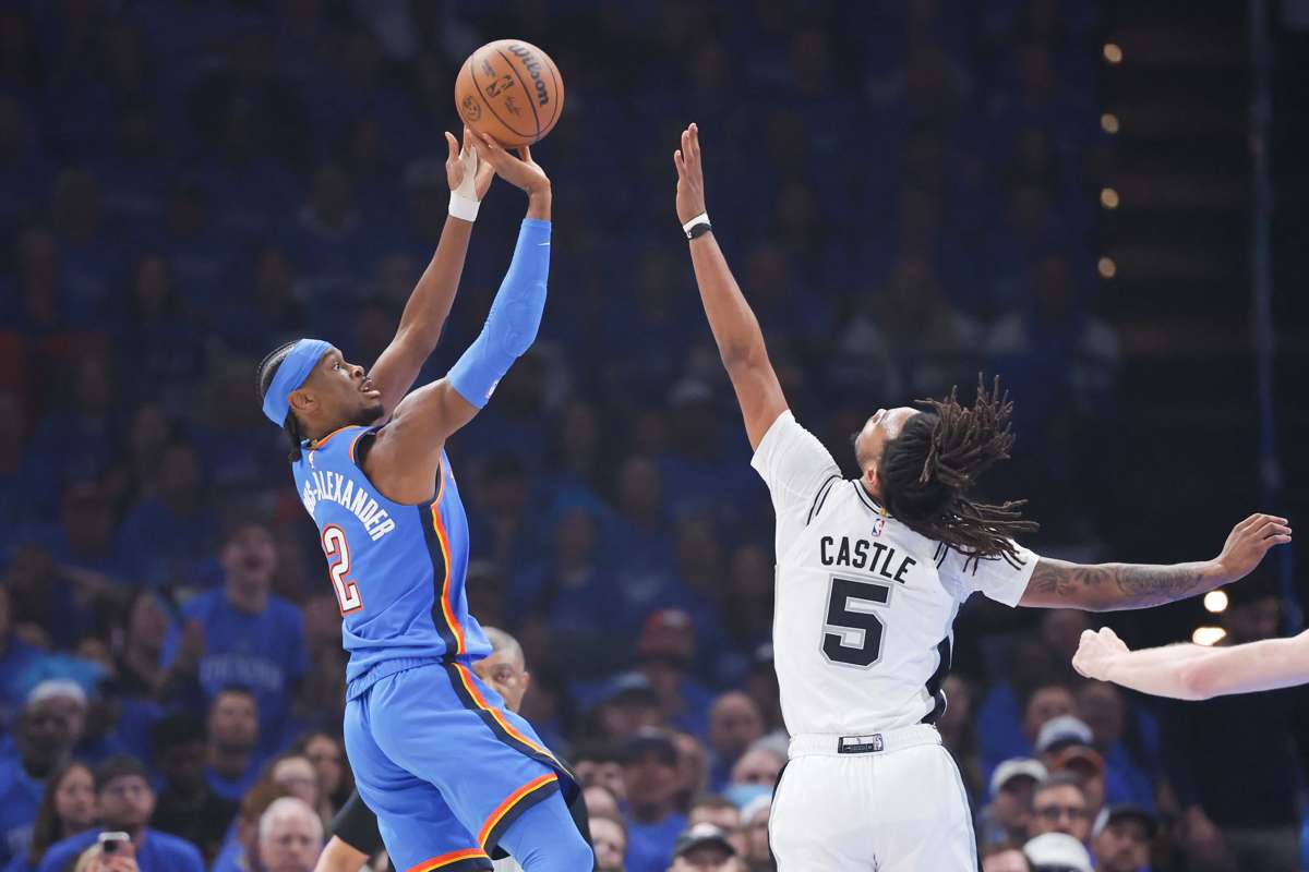 Oklahoma City Thunder guard Shai Gilgeous-Alexander (left) takes a shot as San Antonio Spurs guard Stephon Castle defends during Game 2 of the Western Conference finals. (Alonzo Adams / Imagn Images via Reuters)