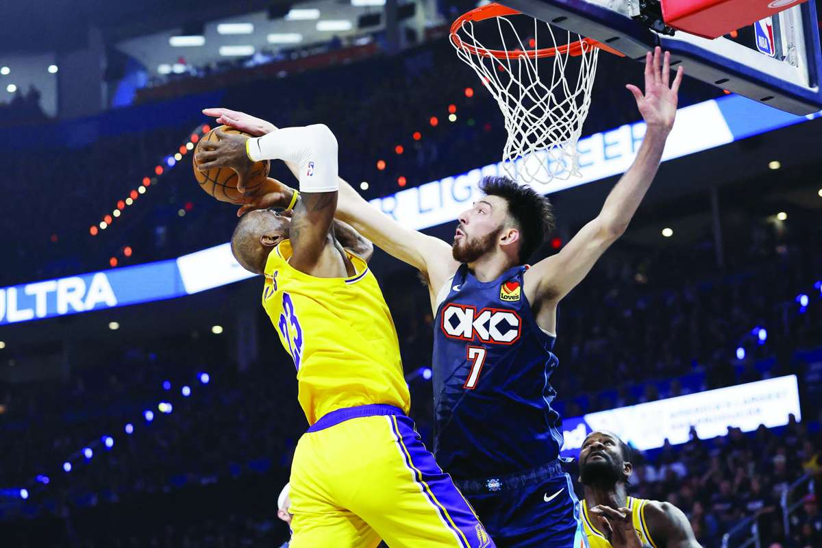 Oklahoma City Thunder center Chet Holmgren (right) blocks a shot by Los Angeles Lakers forward LeBron James in Game 2 of the 2026 NBA playoffs. (Alonzo Adams / Imagn Images / Reuters)