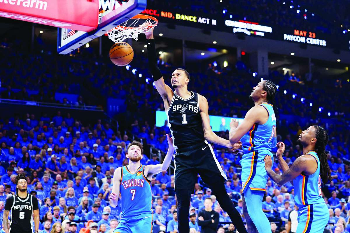 San Antonio Spurs center Victor Wembanyama dunks the ball against the Oklahoma City Thunder during Game 1 of the Western Conference Finals for the 2026 NBA playoffs. (Alonzo Adams / Imagn Images via Reuters)