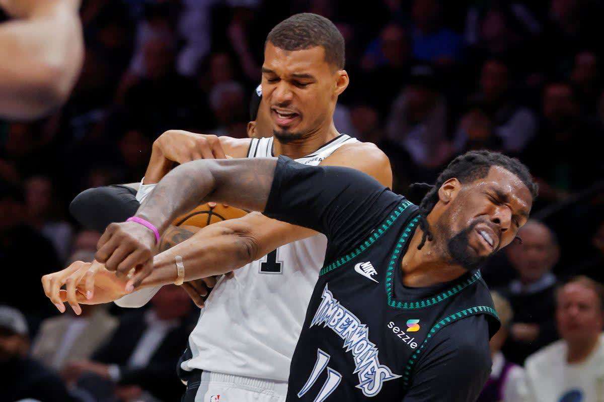 San Antonio Spurs center Victor Wembanyama (left) commits a Level 2 flagrant foul against Minnesota Timberwolves center Naz Reid in Game 4 of the 2026 NBA playoffs. Wembanyama had to leave the game. (Bruce Kluckhohn / Imagn Images via Reuters)