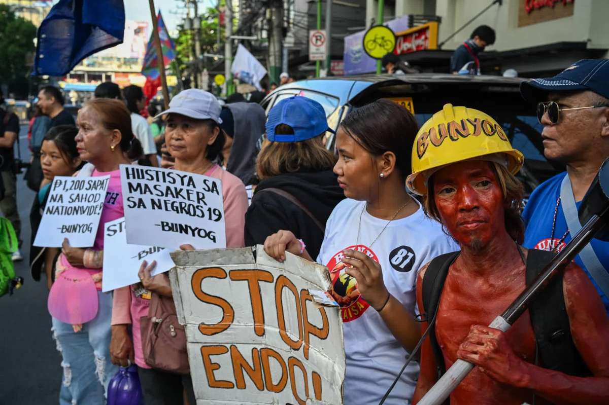 Rallyists bring to attention the killing of 19 suspected members of the New People’s Army in a recent encounter with government troops in Negros Occidental’s Toboso town during Labor Day protests along the streets in Metro Manila on May 1, 2026. (Dominic Rostrata photo)