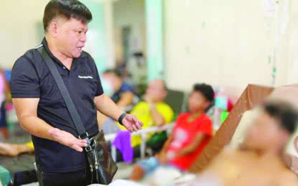 Department of Education - Negros Island Region (DepEd-NIR) Assistant Regional Director Anthony Liobet visits the learner injured in a stabbing incident at the hospital in San Carlos City, Negros Occidental. To ensure safety in schools, the DepEd-NIR is set to map out a comprehensive framework for the protection of learners while continuing to implement existing measures on campuses. (DepEd-NIR photo)