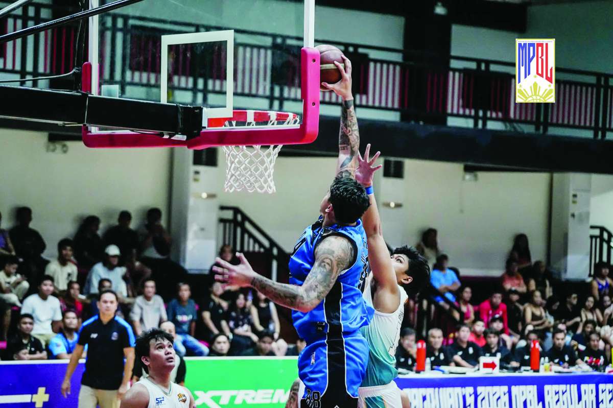 Abra's Drex delos Reyes takes off for a slam against the Negros Hacienderos. (MPBL photo)