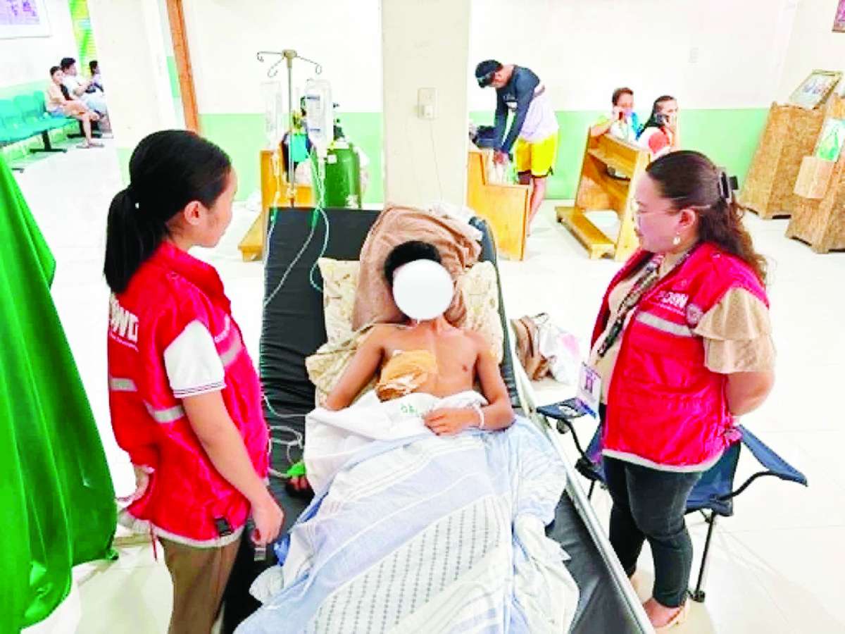 The Social Welfare and Development - Negros Occidental team of the Department of Social Welfare and Development - Negros Island Region visited the Grade 9 student injured in a stabbing incident in San Carlos City, Negros Occidental at the city hospital, in the presence of his parents, on Wednesday, June 24, 2026. The victim and his family received psychosocial support and financial assistance from the agency. (DSWD-NIR photo)