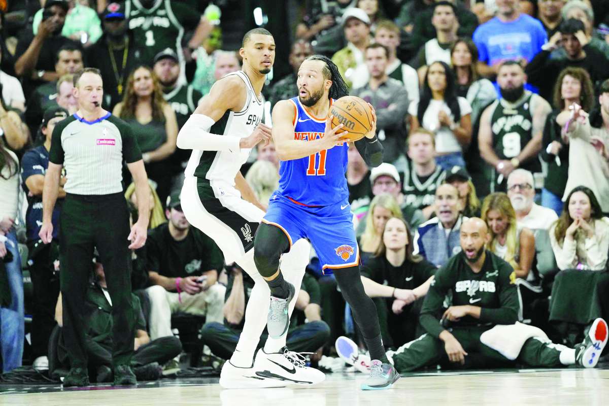 Jalen Brunson (right) looks to move the ball past Victor Wembanyama in Game 2 of the 2026 NBA Finals. (Scott Wachter / Imagn Images / Reuters)