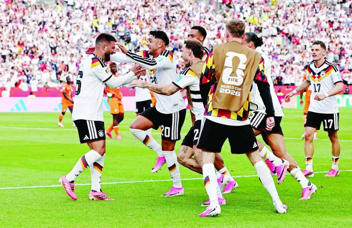 Germany's Deniz Undav celebrates scoring their second goal with Nadiem Amiri and teammates. (Thomas Mukoya / Reuters photo)