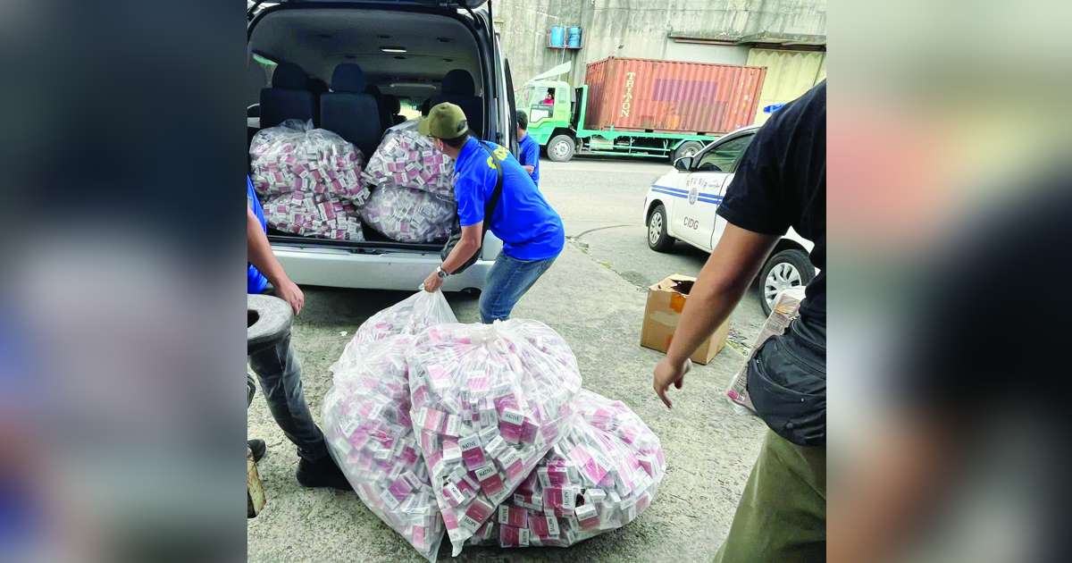Operatives of the Criminal Investigation and Detection Group and Police Station 2 seized an estimated P1.95 million worth of smuggled cigarettes from a warehouse in the Reclamation Area in Bacolod City’s Barangay 8 on Saturday, June 20, 2026. (Aksyon Radyo Bacolod photo)