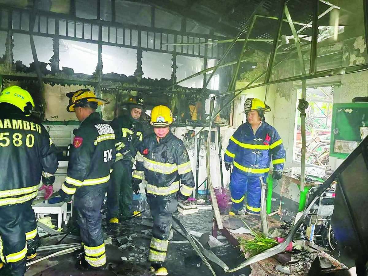 Firefighters battled a blaze that razed a single-storey building at Antonio L. Jayme Elementary School along Alijis-Murcia Road in Barangay Mansilingan, Bacolod City on Sunday, July 12. The fire caused an estimated P960,000 in property damage, while authorities continue to investigate its cause. (Chamber Volunteer Fire Brigade photo)