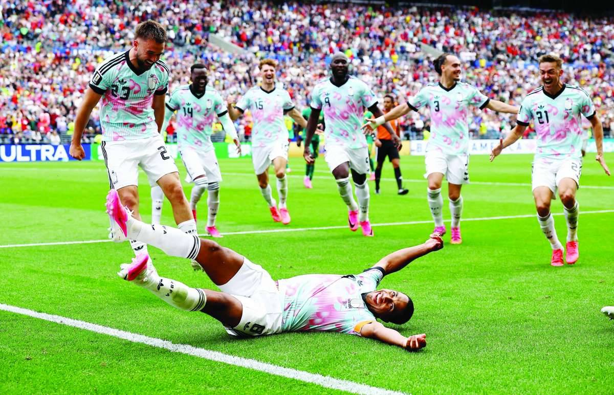 Belgium’s Youri Tielemans celebrates scoring their third goal with teammates. (Agustin Marcarian / Reuters photo)