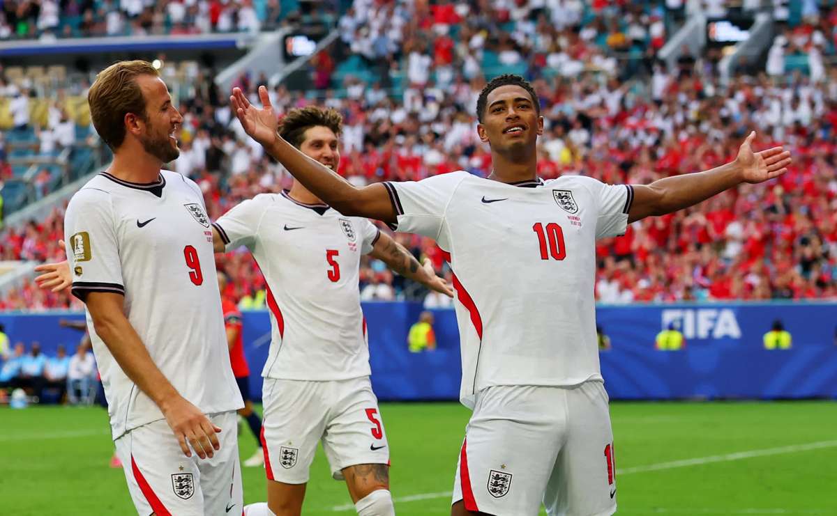 England’s Jude Bellingham celebrates scoring their second goal with Harry Kane and John Stones. (Mike Segar / Reuters photo)