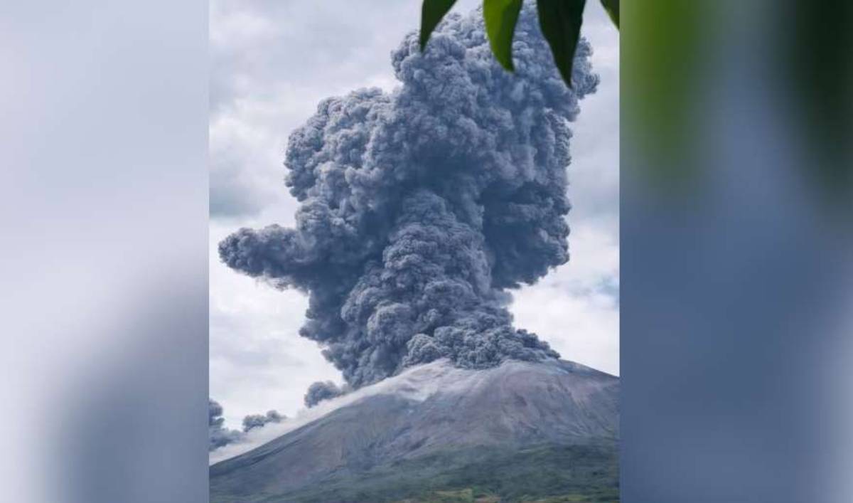 The volcanic eruption generated a dark gray ash plume that rose approximately two to three kilometers above the summit before prevailing winds carried it eastward. (InfoCebu photo)
