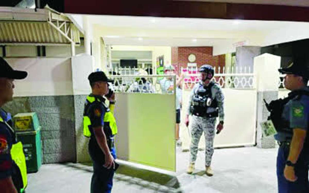 Police and Coast Guard personnel inspect various locations at Silliman University in Dumaguete City, Negros Oriental following a bomb threat received by email on Monday, July 6, 2026. The police declared the university safe after an extensive security sweep found no explosive devices in five locations named in the email. (Coast Guard Station Negros Oriental photo)